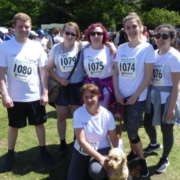 Hine Solicitors Wills and Probate team and supporters with their race numbers at the Gerrards Cross fun run